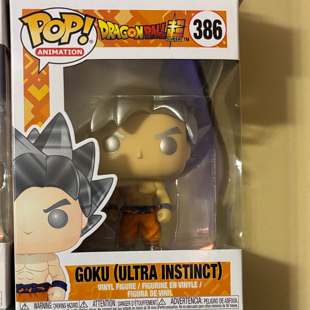 Funko Pop Goku Ultra Instinct with Silver Hair and Orange Outfit